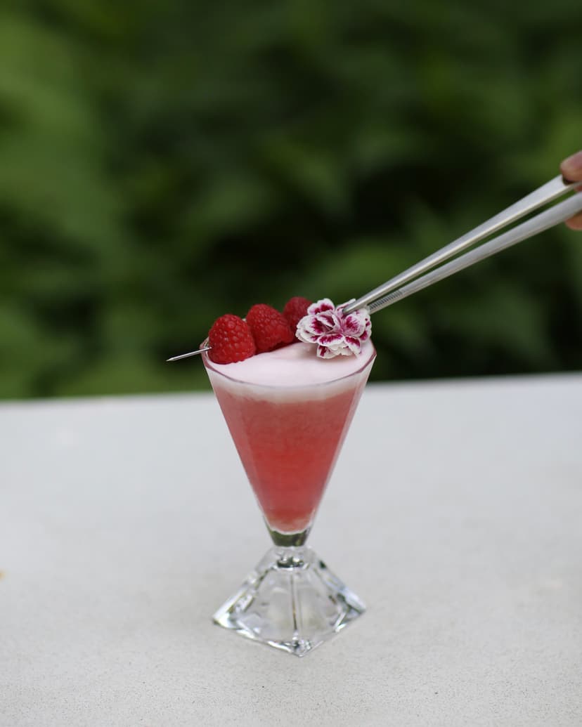 Cocktail shaker shaking cocktail.