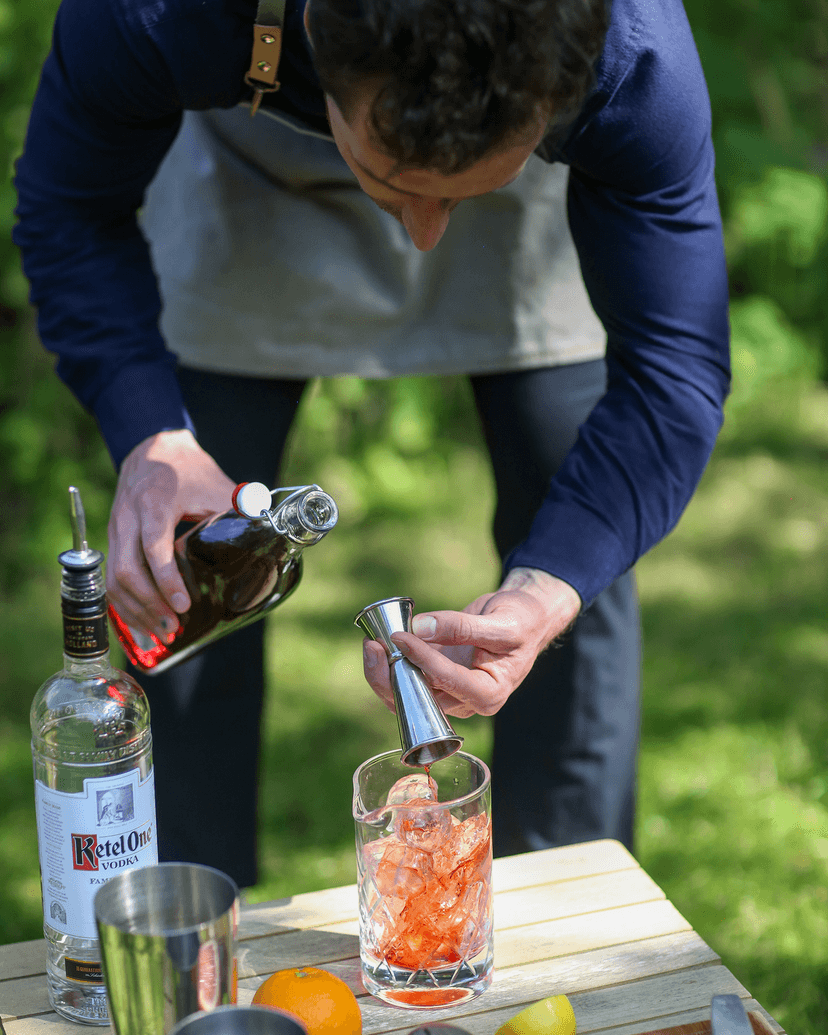 Cocktail shaker shaking cocktail.