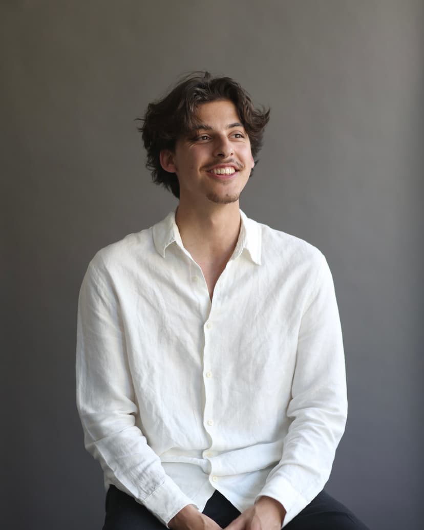 Model wearing women's black cotton crewneck tee.